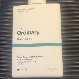 The Ordinary Hair Care Conditioner with White and Teal Accents